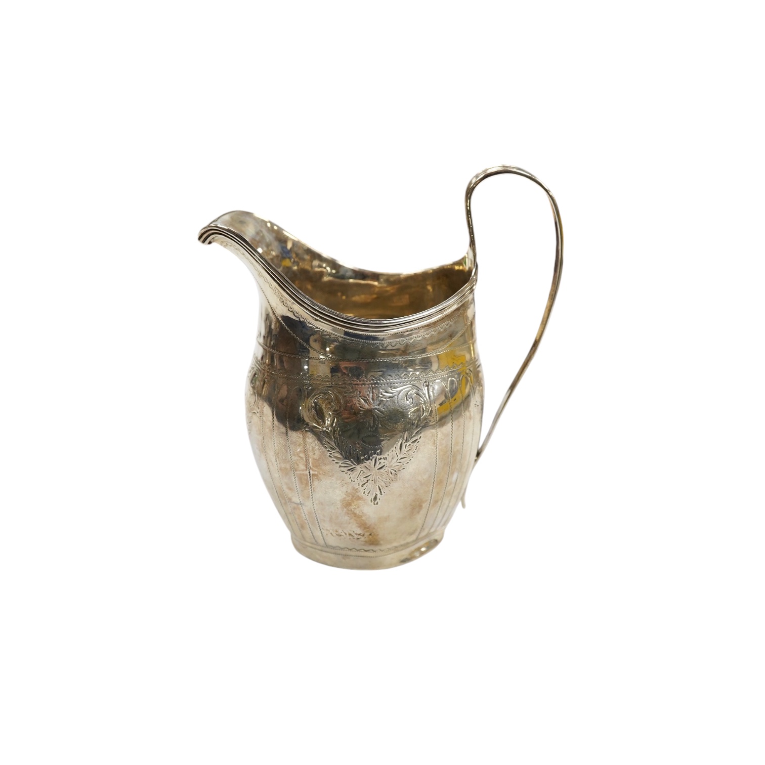 A George III engraved silver helmet shaped cream jug, London, 1801, 12.4cm, 3.4oz. Condition - poor